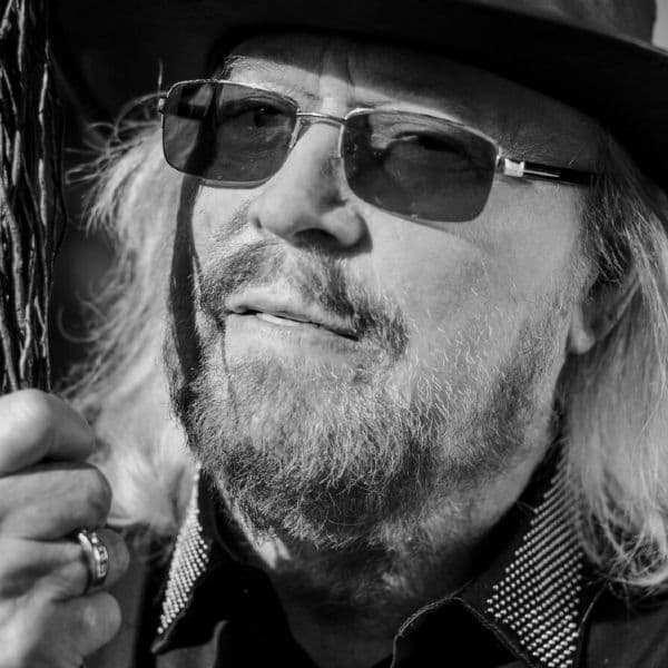 Here's what we know about the real-life story of Barry Gibbs and the Bee Gees - we got teary-eyed for a second. Take a closer look.